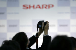 Sharp будет выпускать копиры для HP?